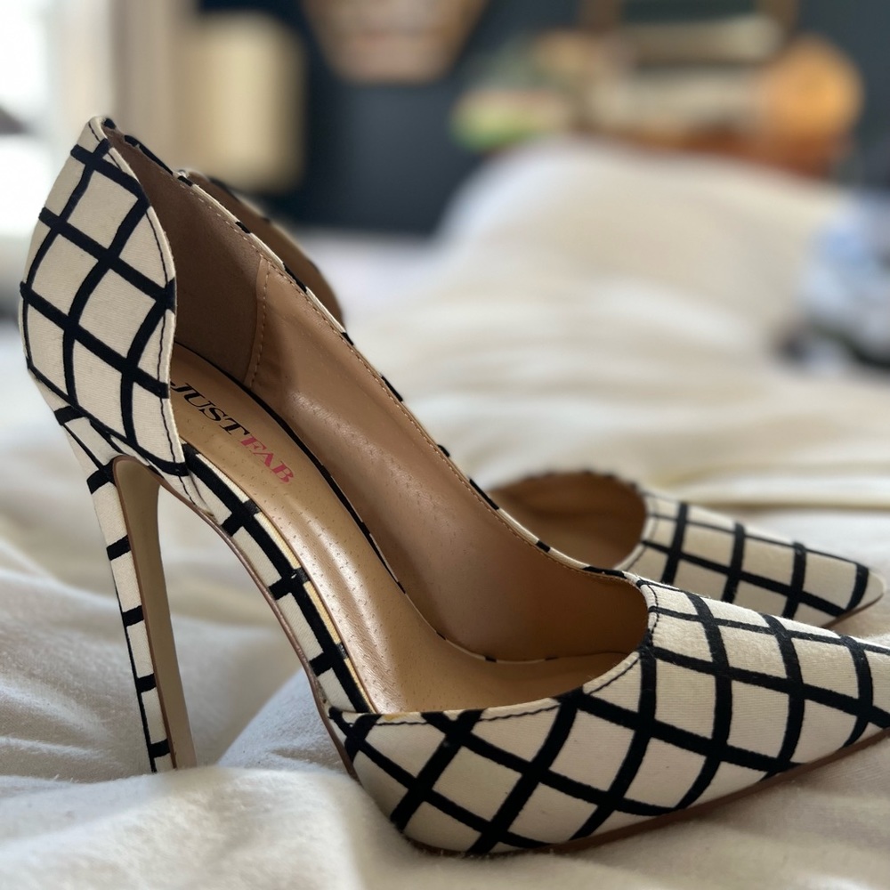 Just fab brand white and black shoes high pump heel. Lightly worn